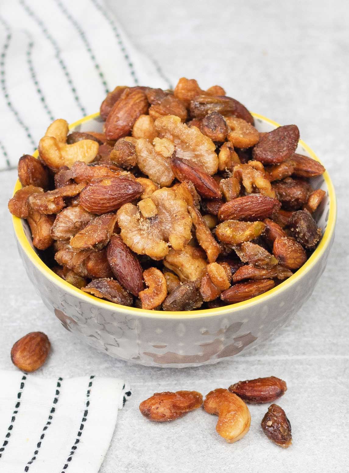 a bowl full of Honey Roasted Mixed Nuts.