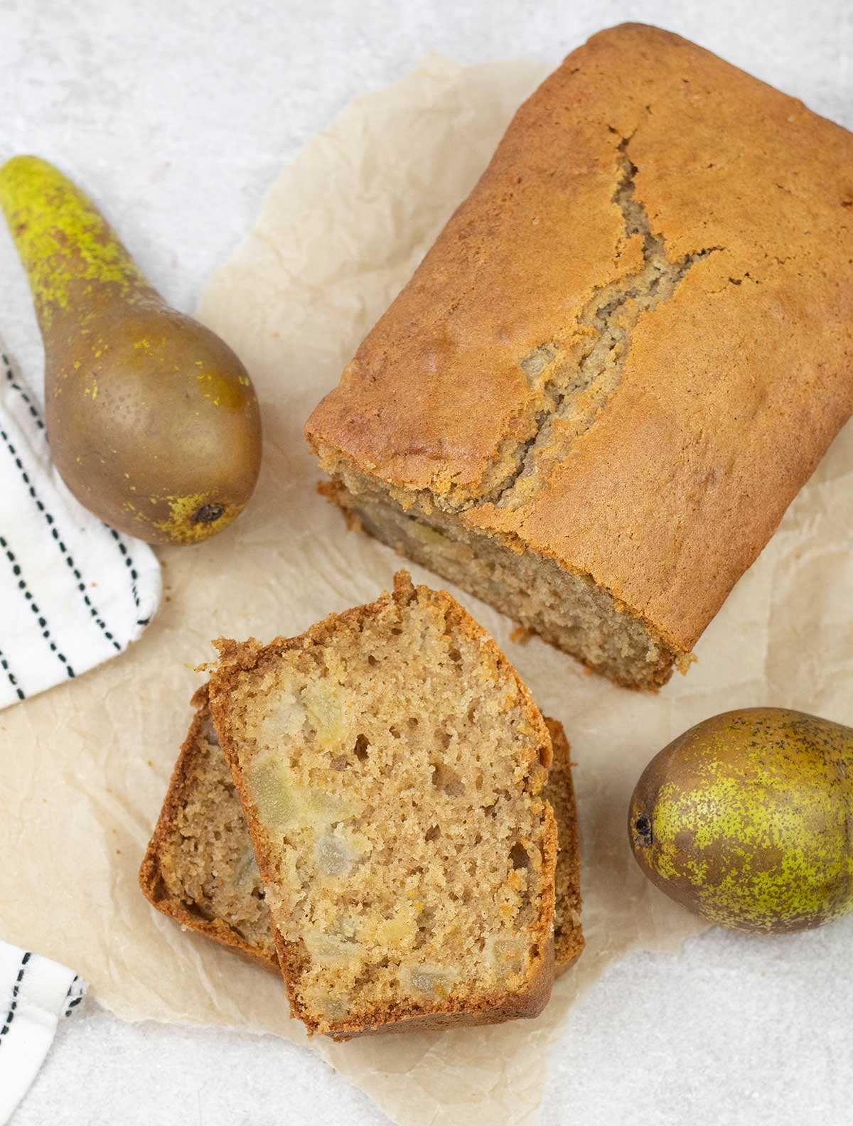 Pear Bread along with some pears around it