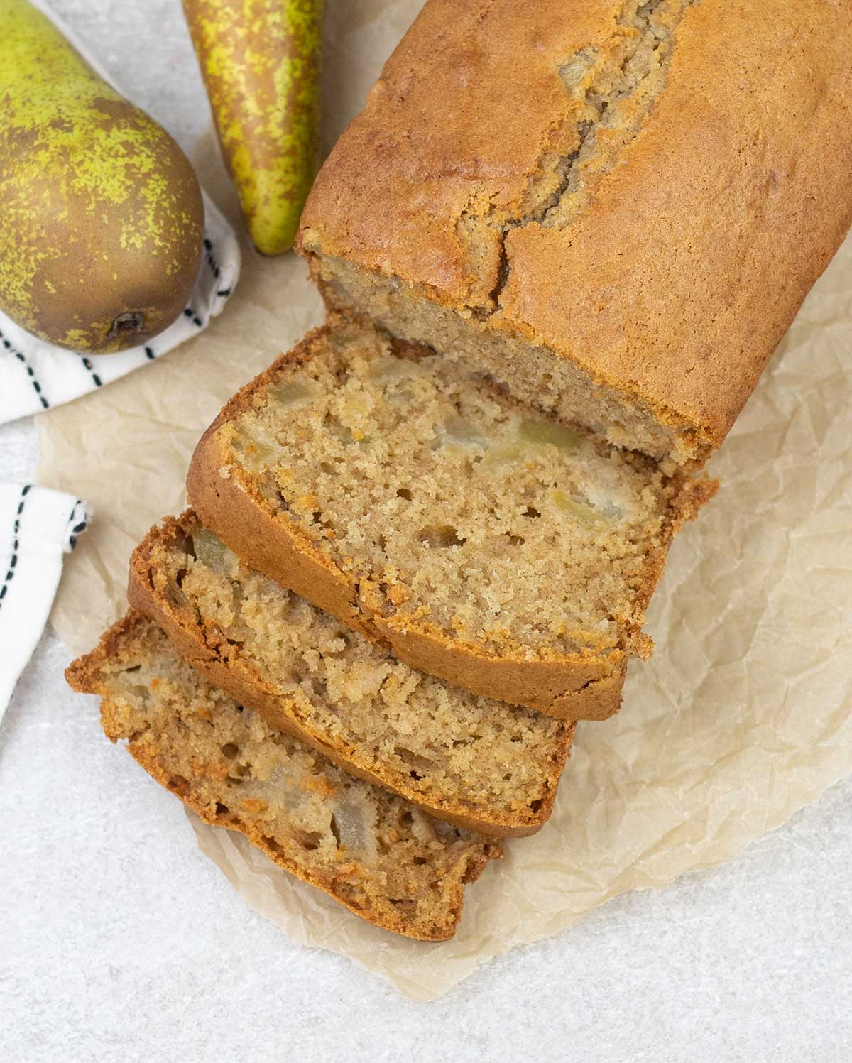 Pear Bread along with some pears in the background