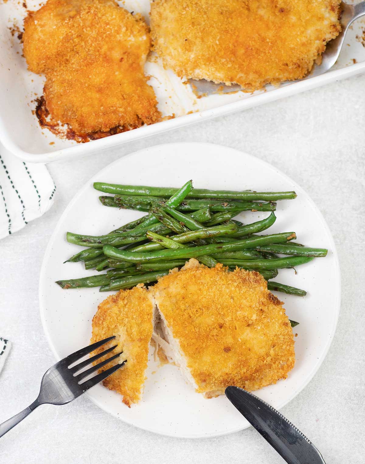 Baked Panko breaded chicken breast and some green beans.