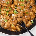 Chinese peanut butter chicken in a pan.