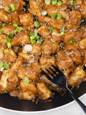Chinese peanut butter chicken in a pan.