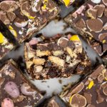 Slices of chocolate easter tiffin studded with mini eggs.