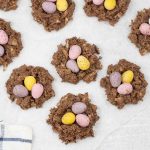 Easter nests topped with Easter mini eggs.