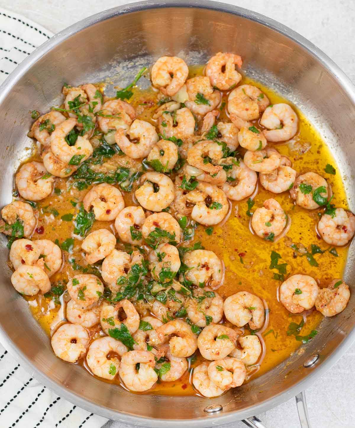 Gambas Pil Pil in a frying pan.