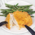 Panko breaded chicken breast cut with the knife.