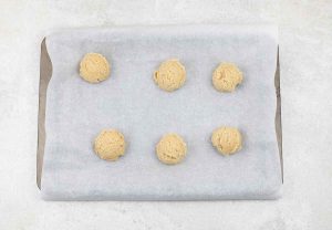 Scoop about 1 tablespoon of the dough per cookie and then put balls on the baking sheet.