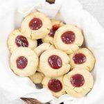 jam filled cookies in a small basket.