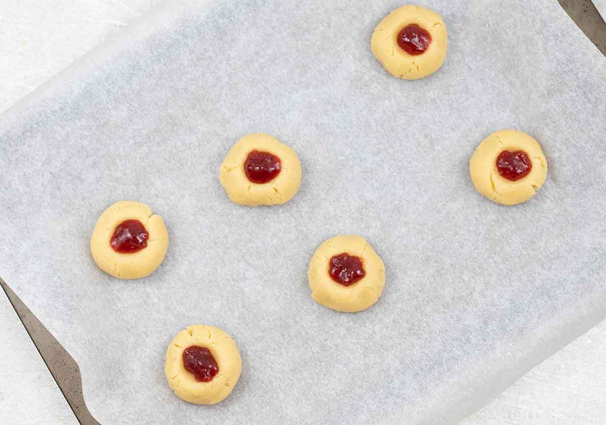 fill each well with about ¼ teaspoon of the strawberry jam.