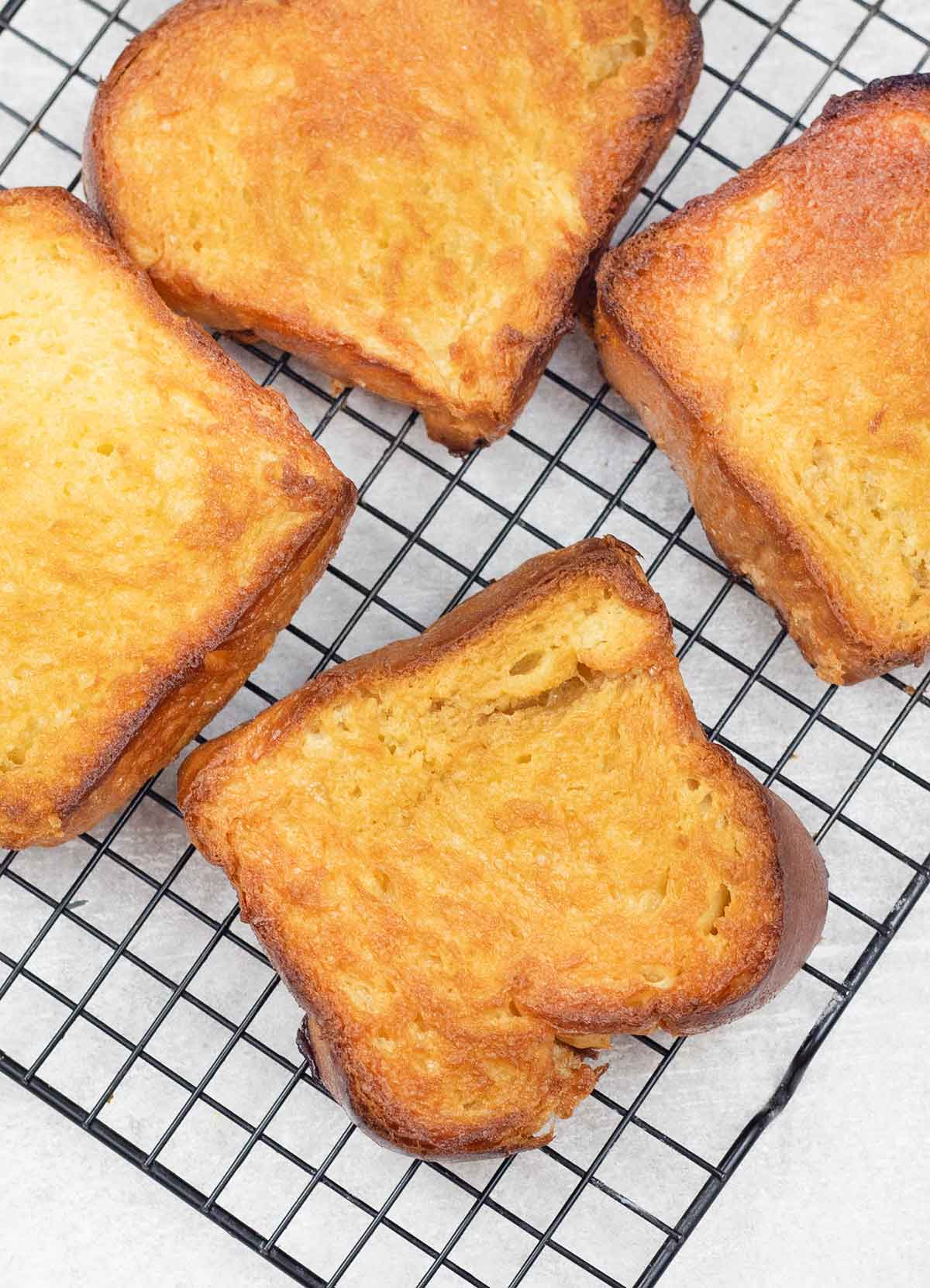 Honey butter toast on a cooling rack.