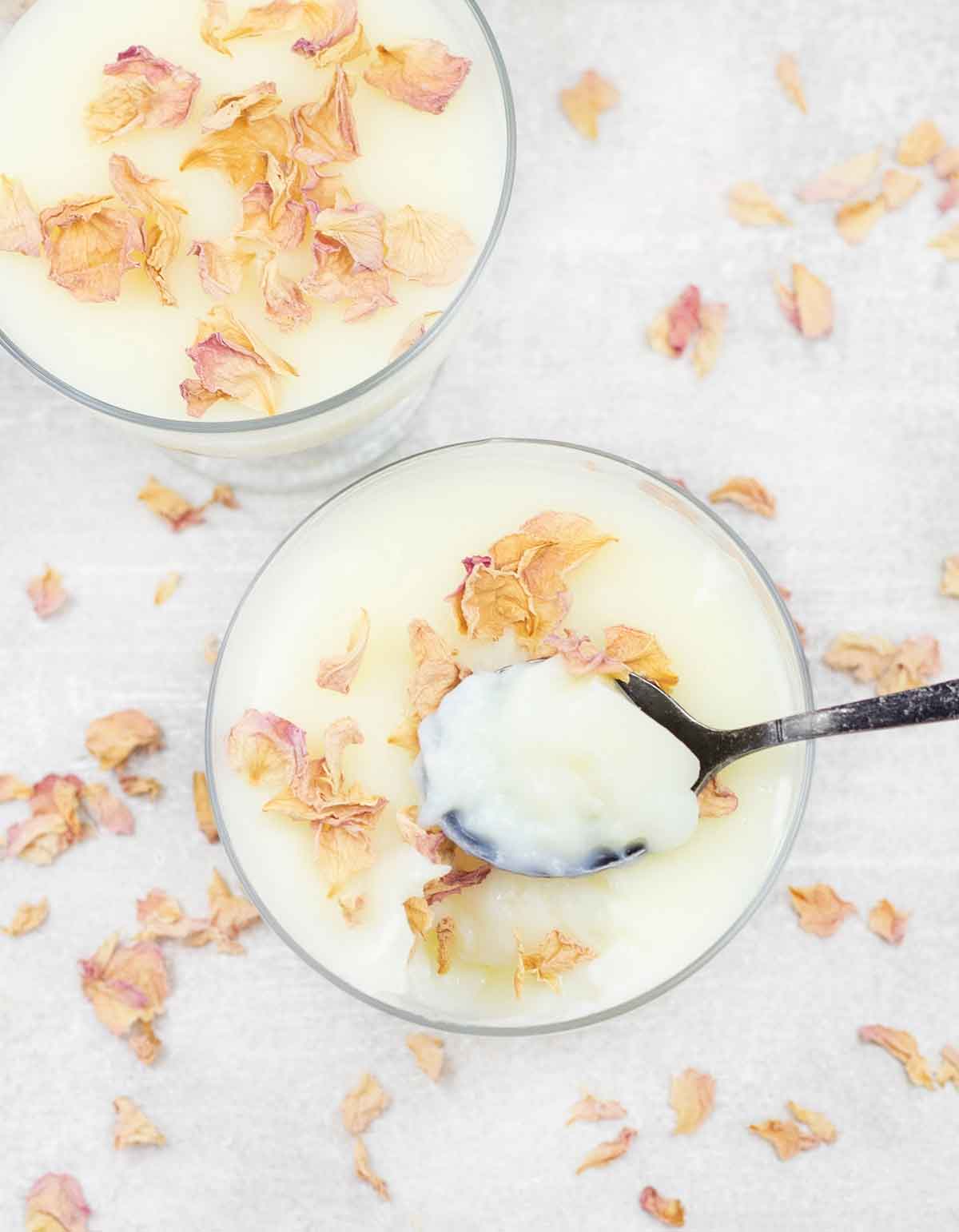 milk pudding topped with rose petals.