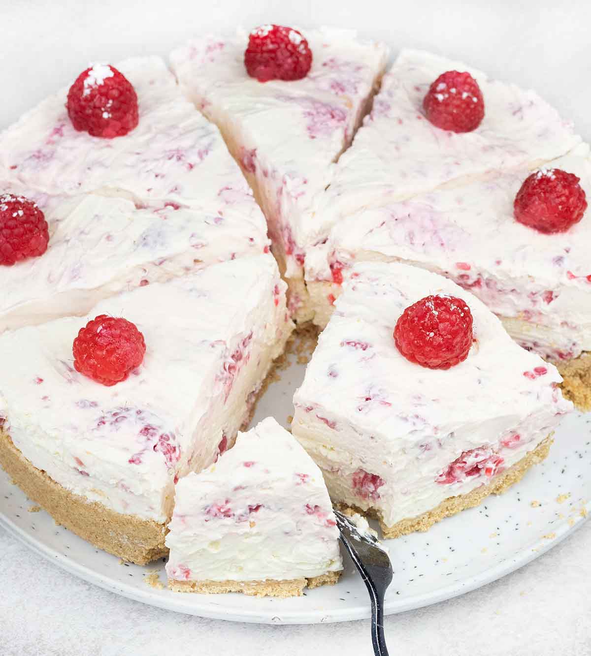 Cut the raspberry cheesecake.