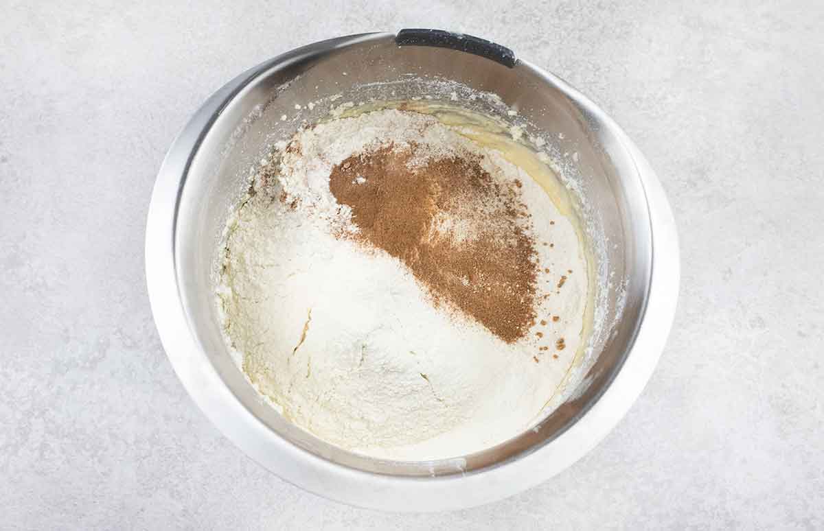 Mix in the sifted flour, baking soda, salt, cinnamon, and nutmeg.