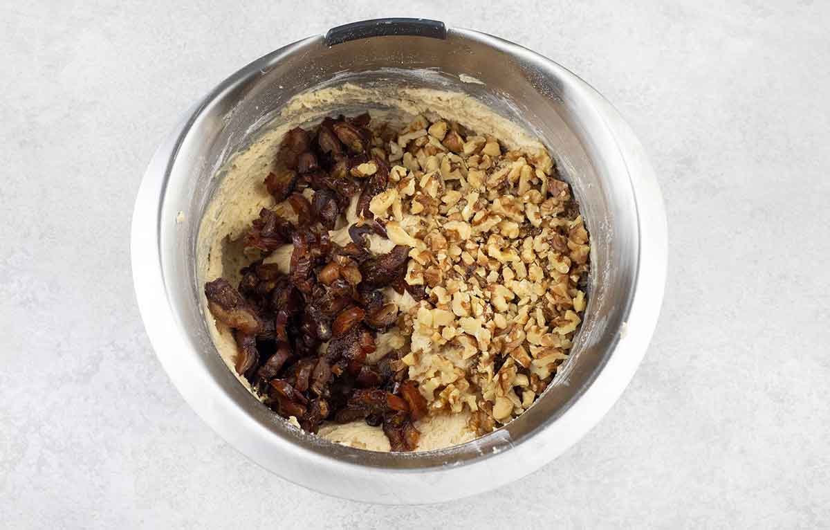 Add the chopped dates and walnuts to the batter.