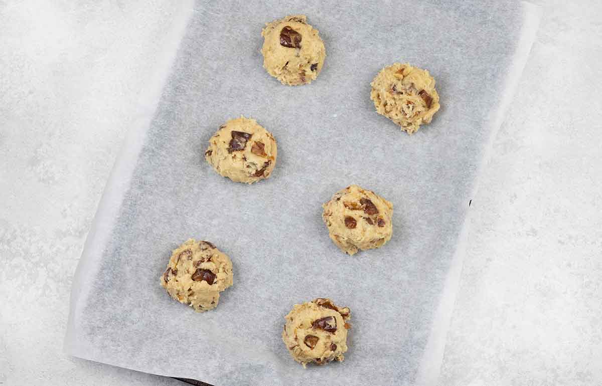 Scoop tablespoons of the cookie batter onto the baking sheet.