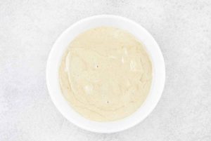 tahini sauce in a small bowl.