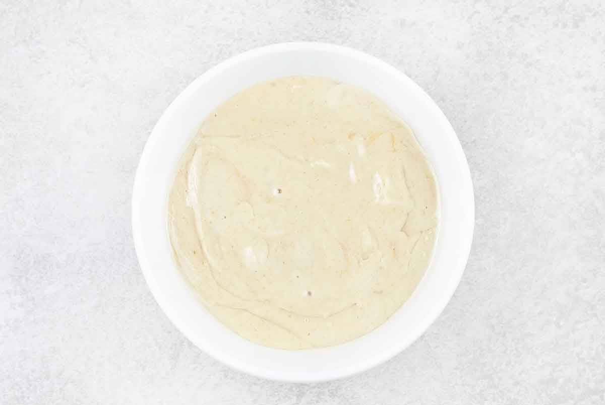 tahini sauce in a small bowl.