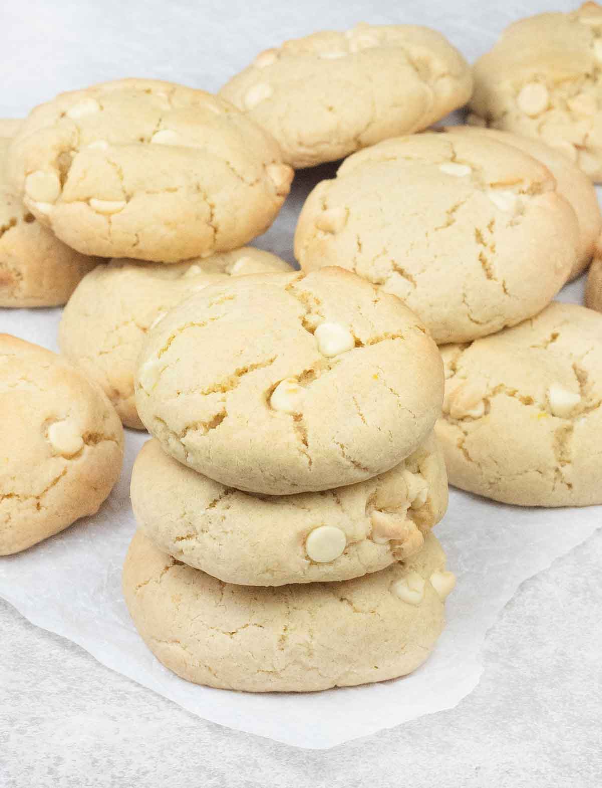 lemon white chocolate cookies on top of each others.