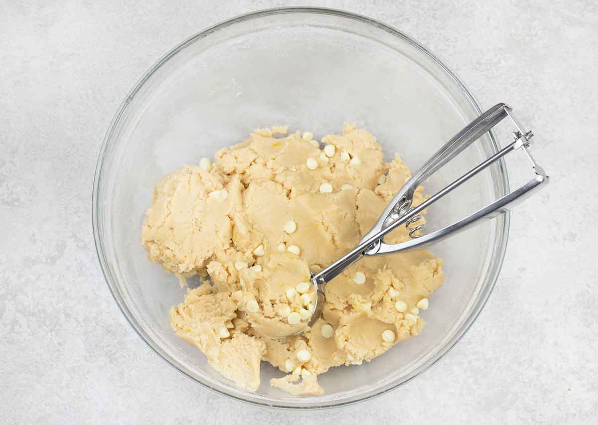 use a cookie scoop to scoop the dough out and roll it into balls.