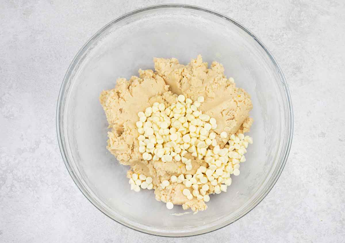 Stir in flour, baking soda and salt, then fold in the white chocolate.