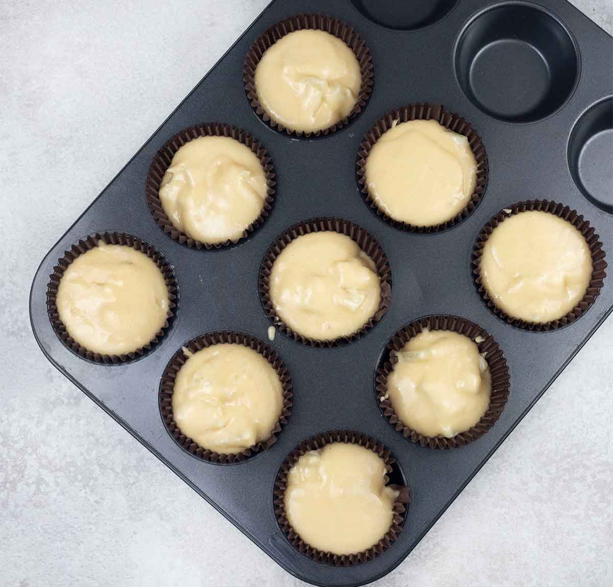 Scoop the batter into the muffin tin using a cookie scoop.