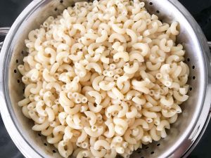 Cook the pasta in boiled salted water and then drain.