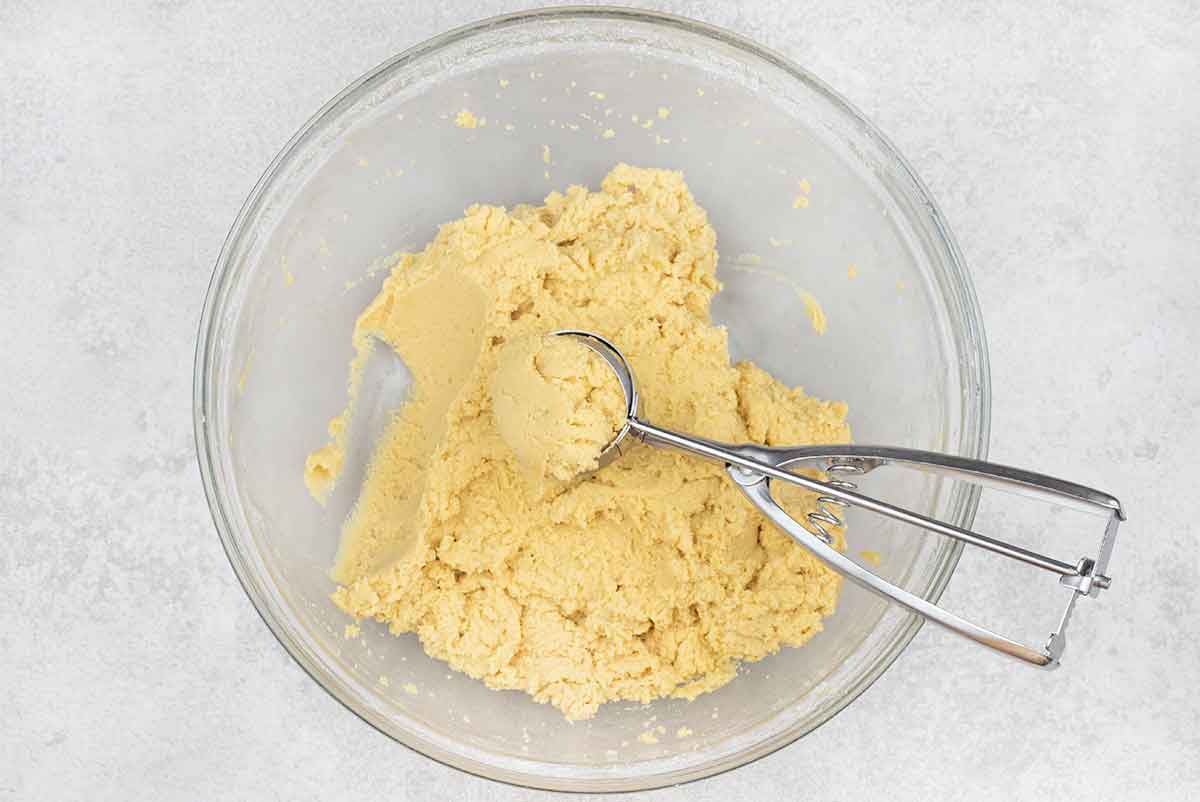 Use a large cookie scoop to scoop the cookie dough.