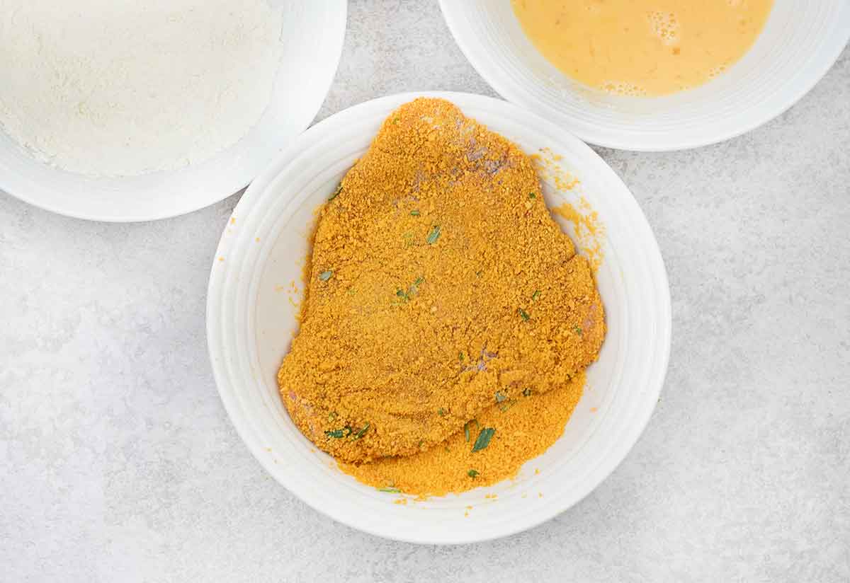 Dredge each beef cutlet in flour first, dip into the beaten eggs. Finally, dredge in the breadcrumb mixture.