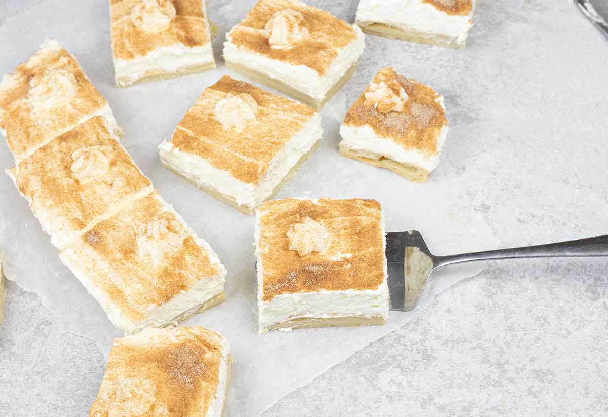 Cut the churro cheesecake into small bars and serve.