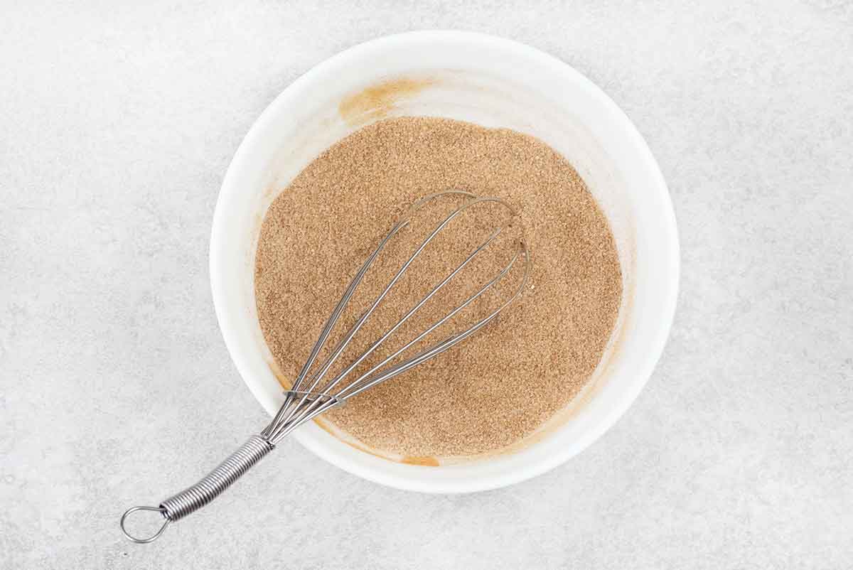 In a small bowl, mix the ground cinnamon and granulated sugar.
