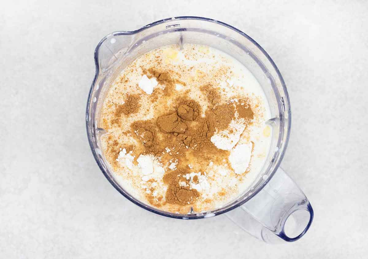 In the blender, add corn kernels, milk, sugar, cinnamon powder, cornstarch, and water.