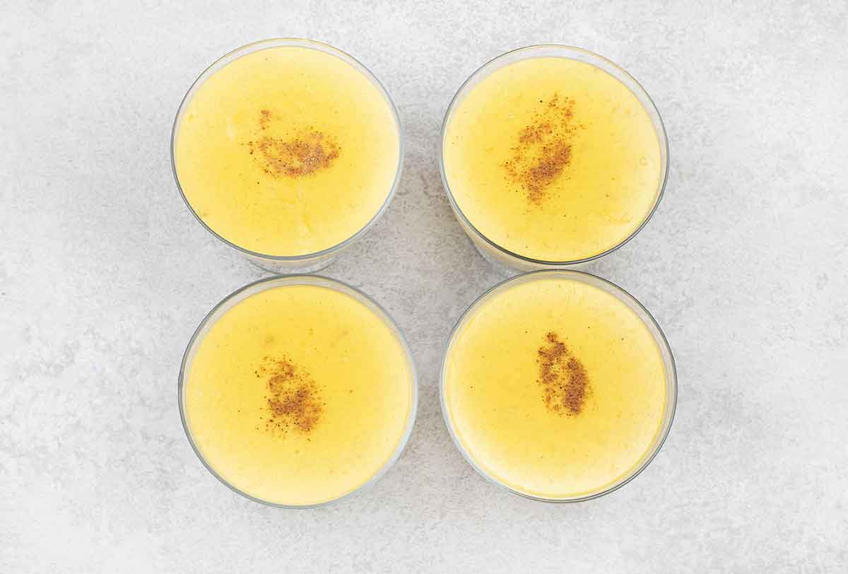 Pour the pudding into glasses, scatter some nutmeg on top and chill.