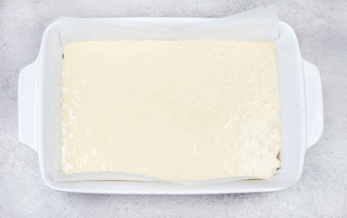 Transfer the batter to 3x9-inch baking pan.