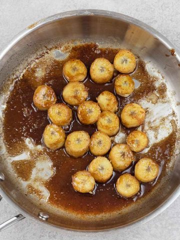 Fried bananas in a frying pan.