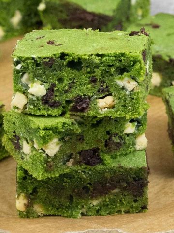 Stack of matcha brownies.