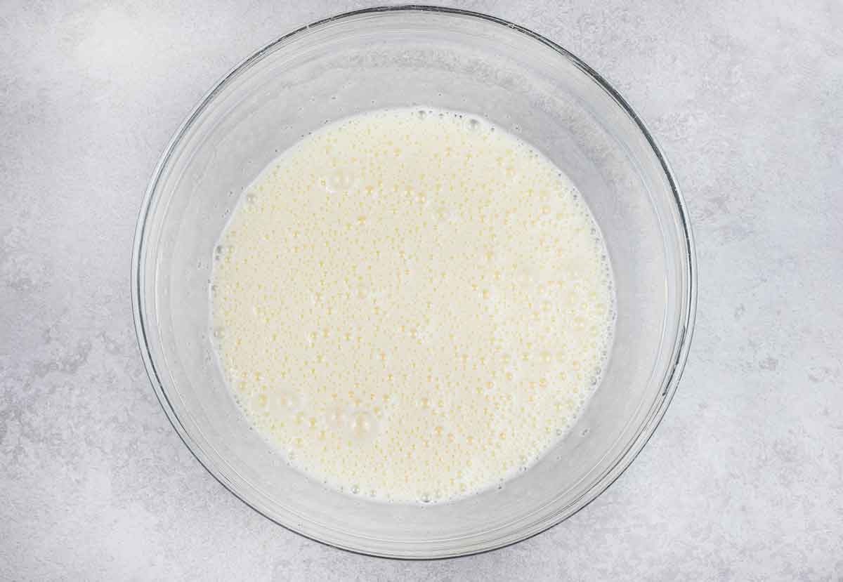 Whisked sugar with eggs until fluffy.