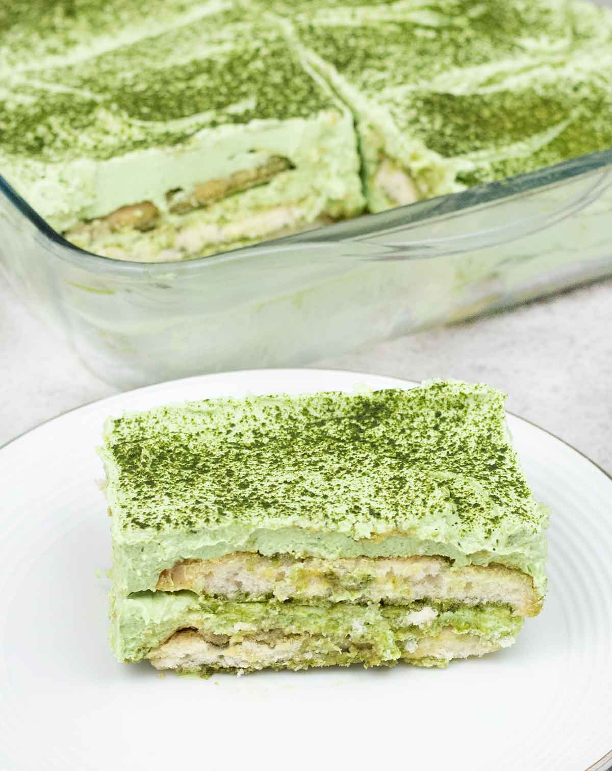 Matcha tiramisu slice on a plate.