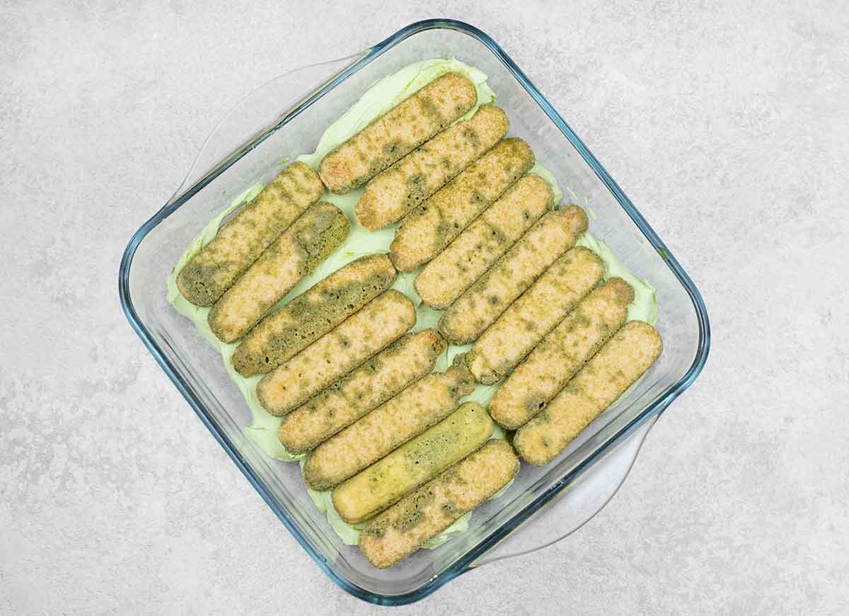 Add another layer of soaked ladyfingers.